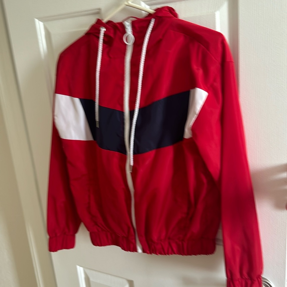 red zip up jacket